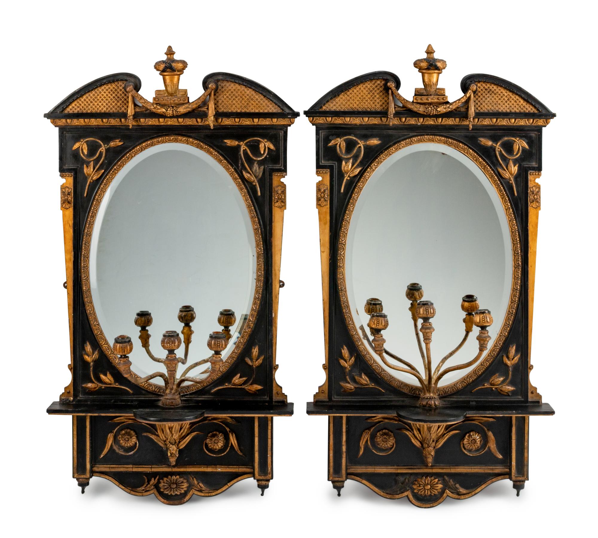 A Pair of English Parcel-Gilt and Ebonized Girandole Mirrors — 19TH CENTURY