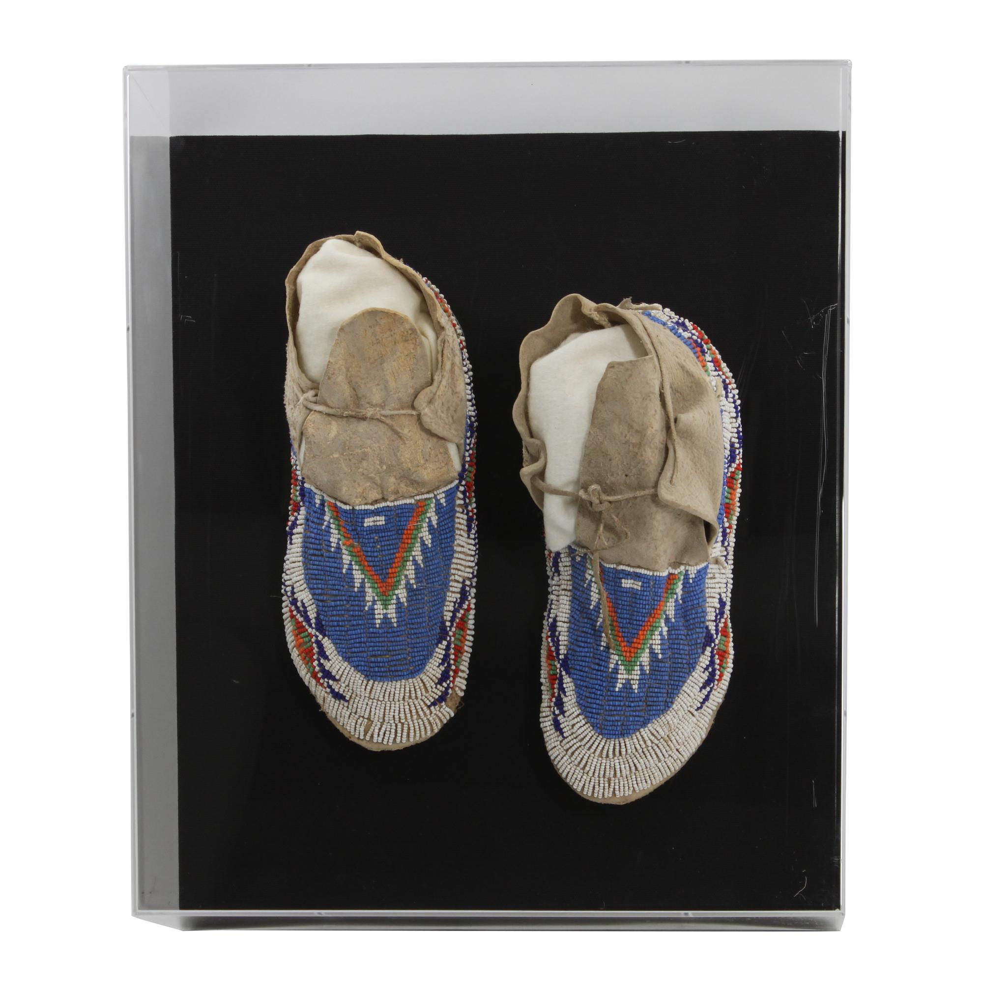 A Pair of Sioux Mocassins Length of mocassins 9 inches — CIRCA 1945