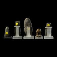 Four Mezcala Greenstone Standing Figures and a Temple