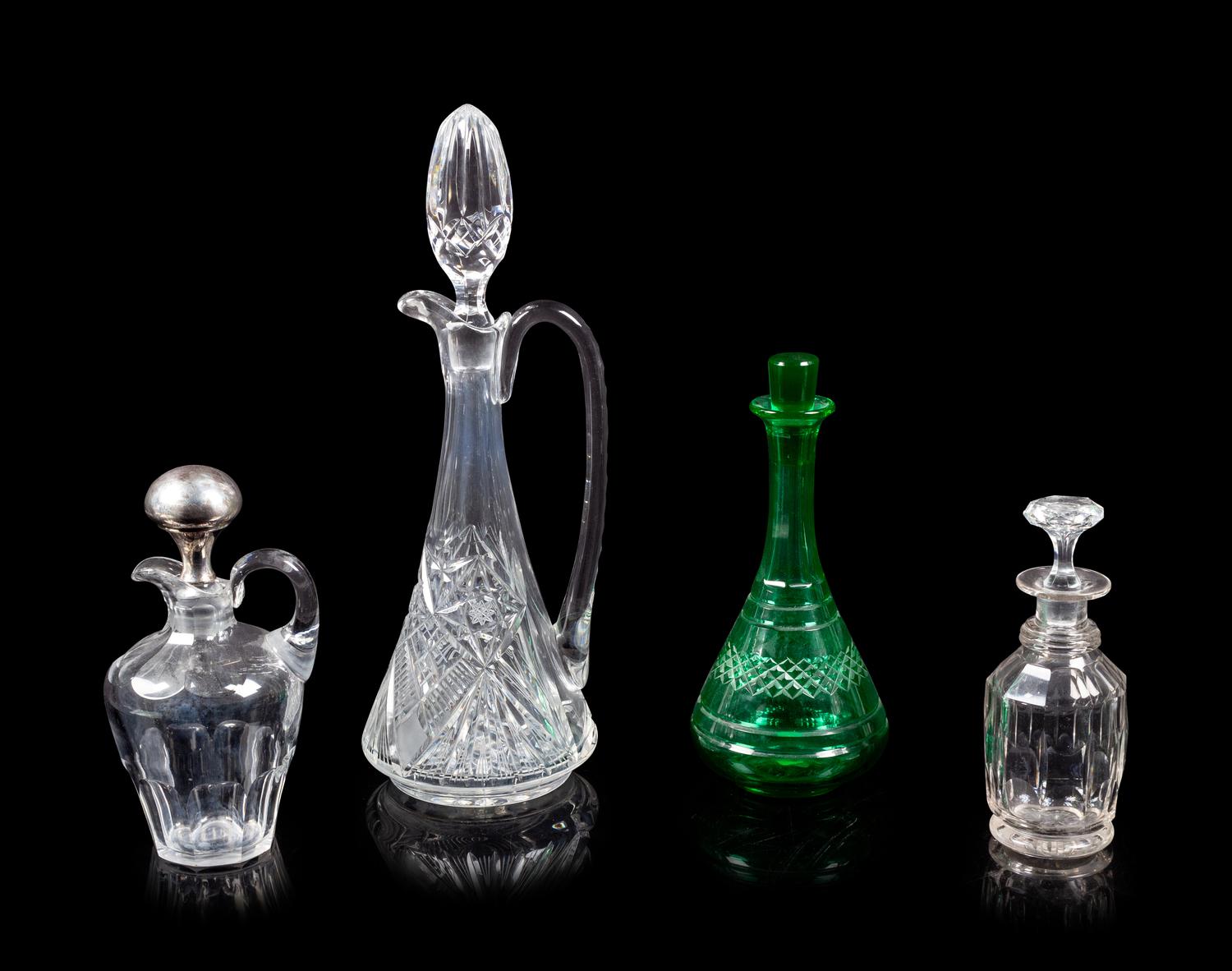 Four Cut and Molded Glass Decanters