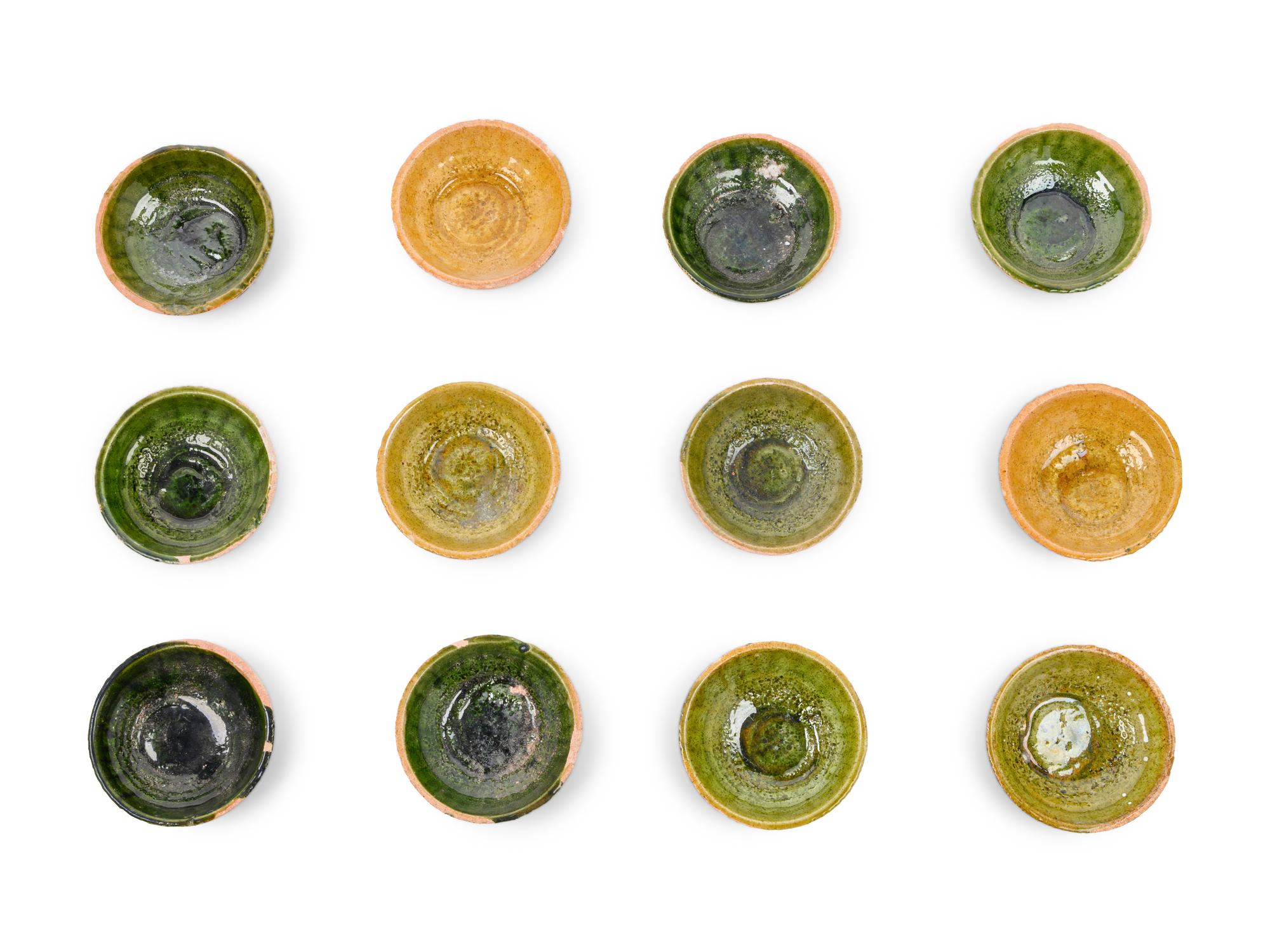 A Set of Forty-Six Glazed Pottery Bowls