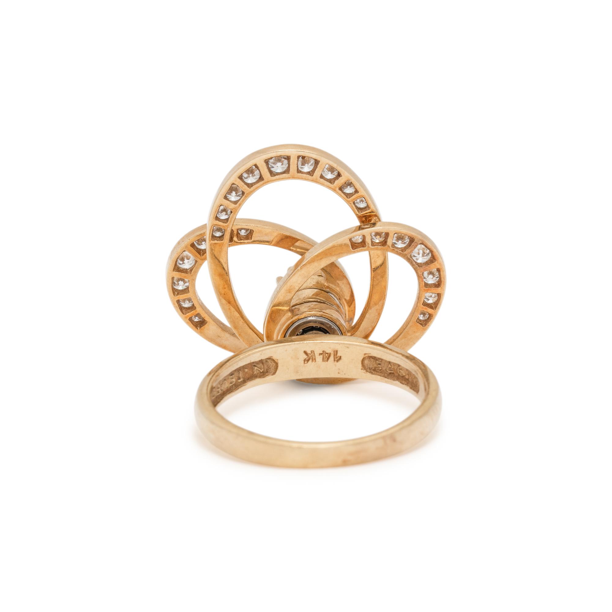 N. TEUFEL, YELLOW GOLD AND DIAMOND KINETIC RING