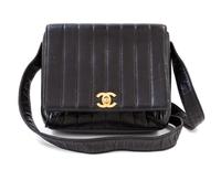 A Chanel Black Lambskin Vertical Quilt Flap Shoulder Bag, 7.5" x 7" x 2". Strap drop: 19".
