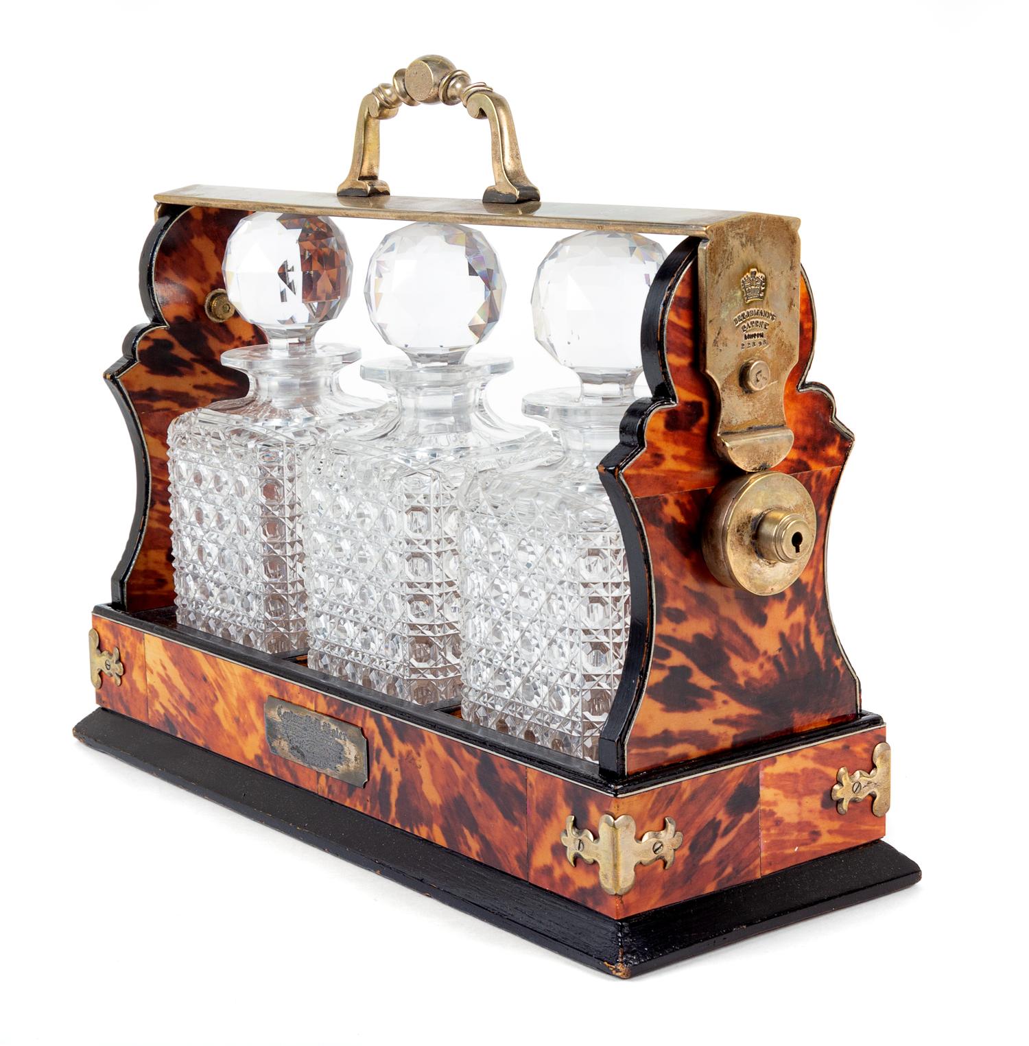 A Victorian Tortoise Shell Veneered Tantalus Height 13 x width 16 1/4 x depth 6 1/8 inches. — 19TH CENTURY