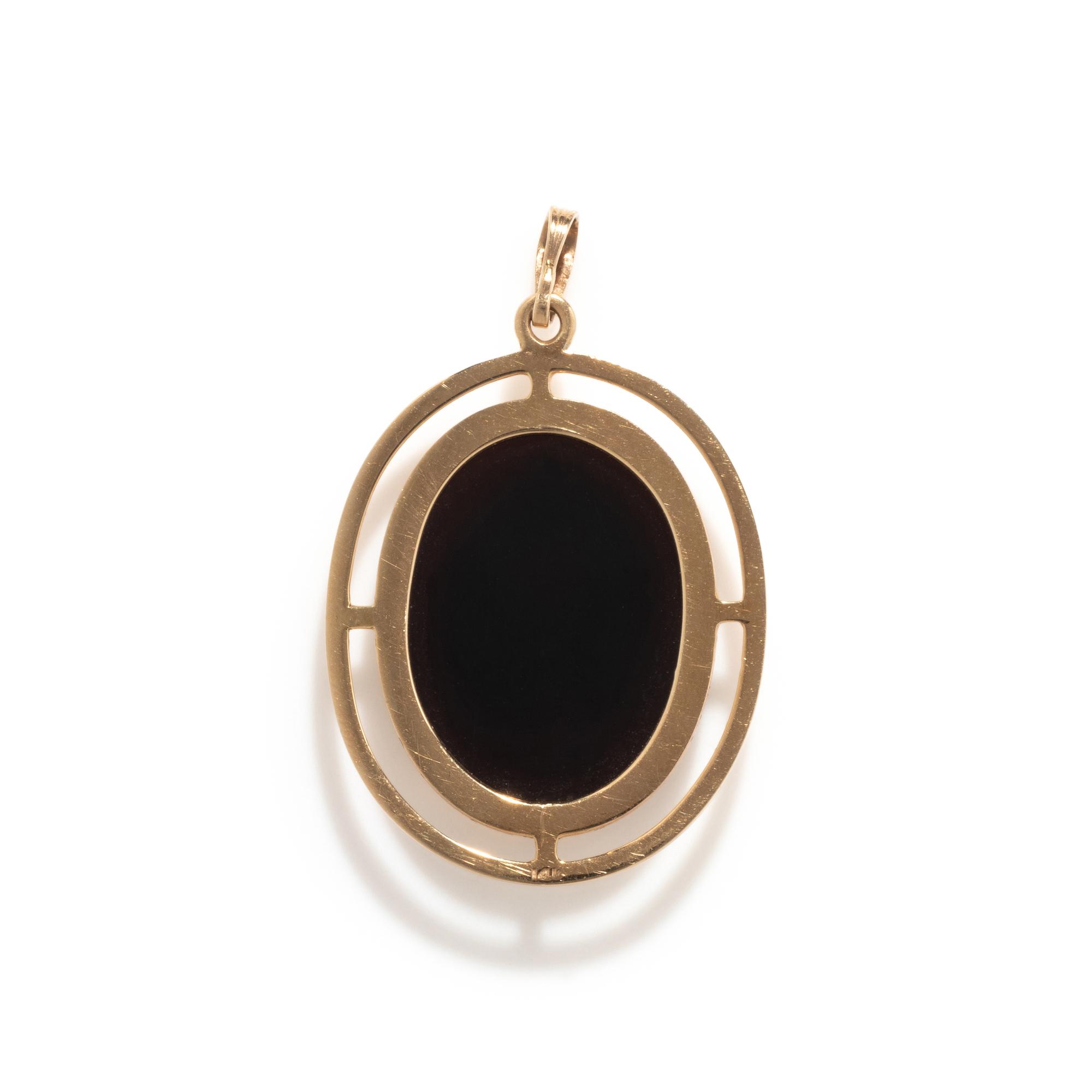 A Neoclassical Gold and Onyx Pendant with a Bust of Athena