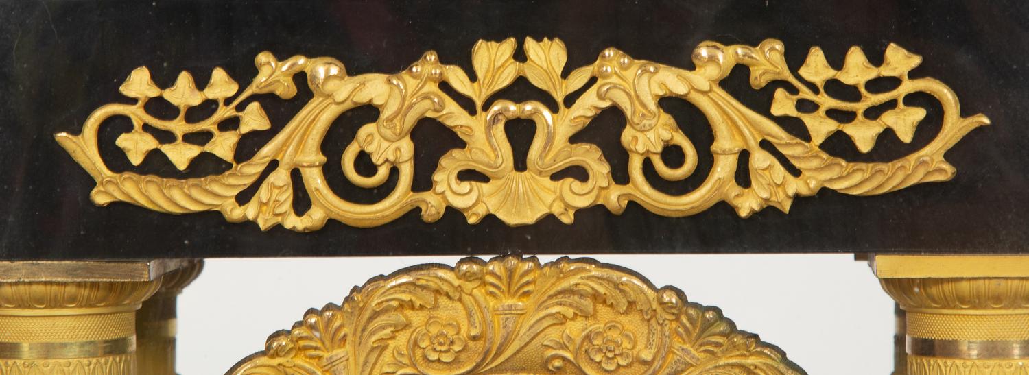 A Charles X Gilt Bronze Mounted Ebonized Portico Clock