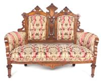 A Victorian Parquetry Walnut Settee, Width 56 inches.