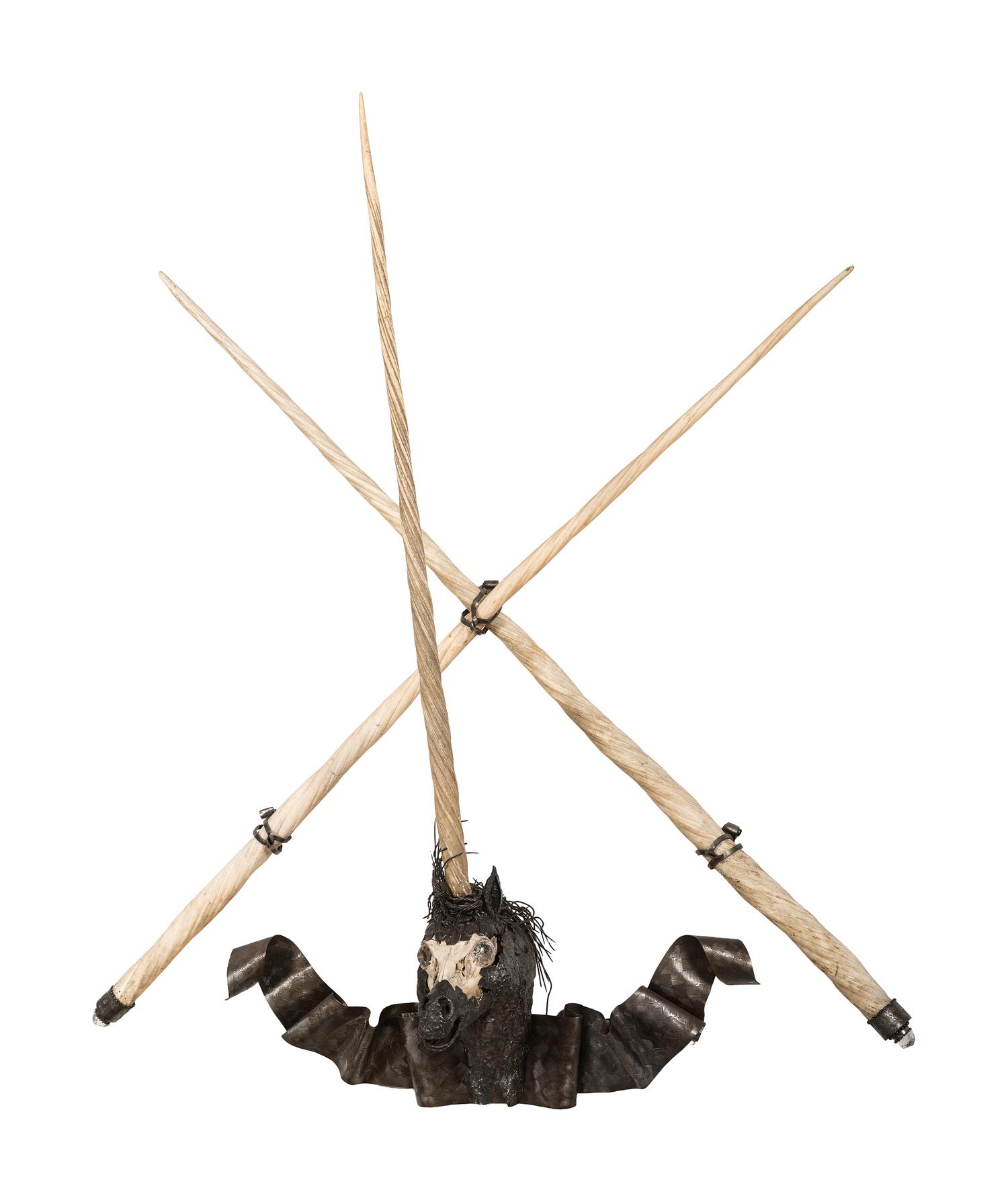 A Cast Metal, Bone, and Narwhal Tusk Installation