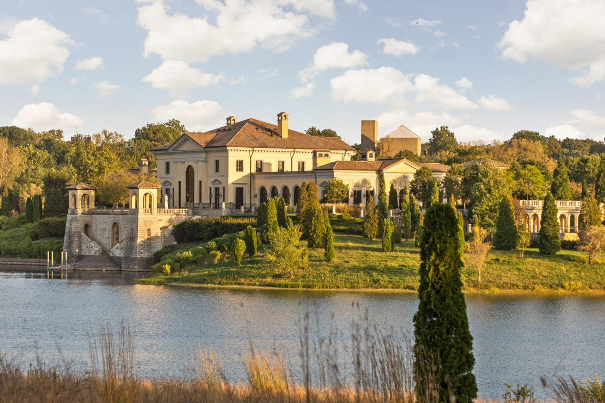 A Regency Style Inlaid Mahogany, Ebonized and Parcel-Gilt Side Table