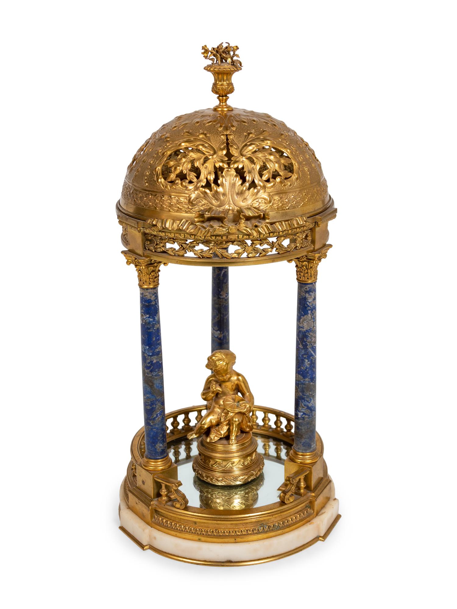 A Gilt Metal and Lapis Lazuli Table Ornament