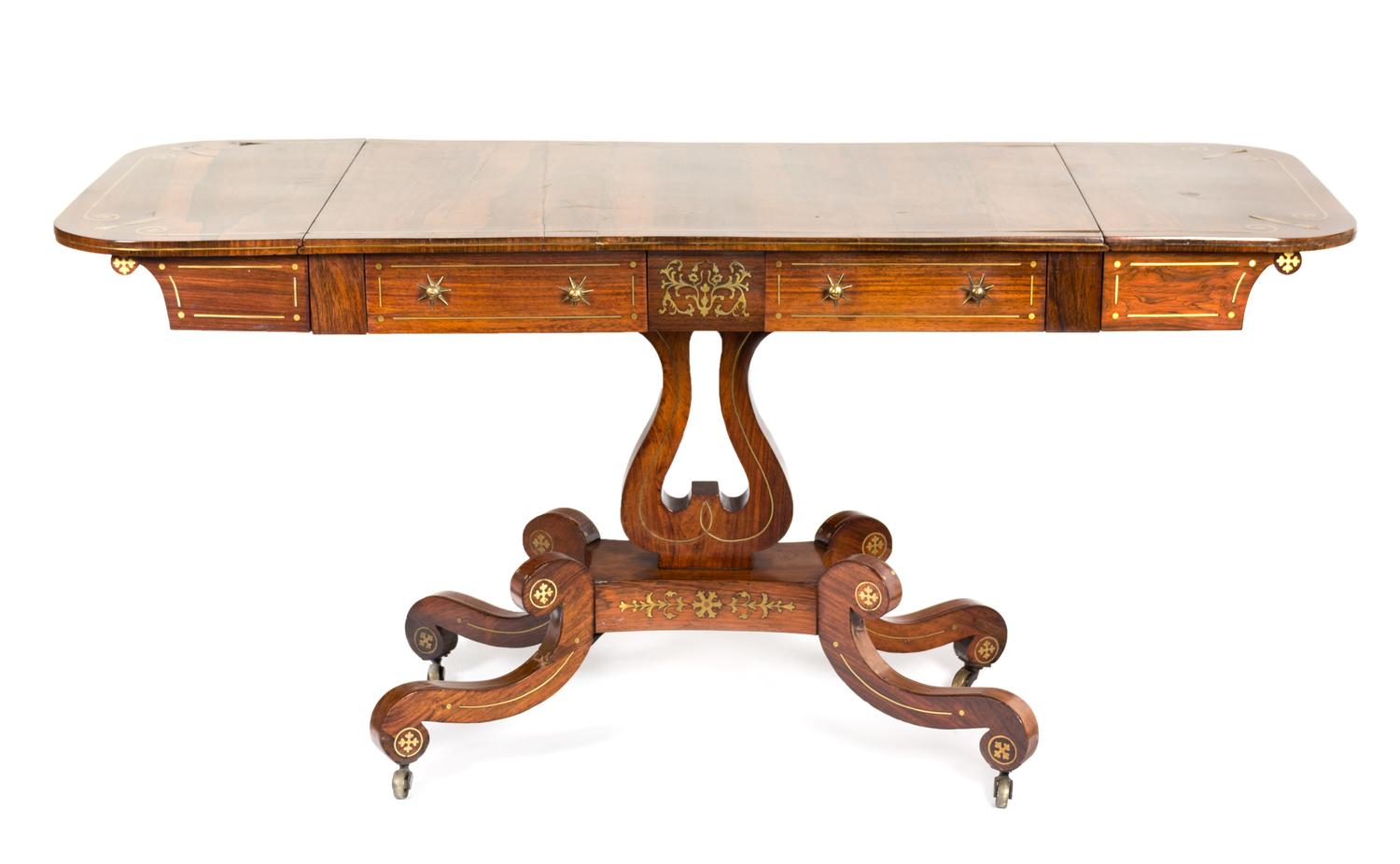 A Late Regency Brass-Inlaid Rosewood Sofa Table Height 27 x width (extended) 77 x depth 24 inches. — CIRCA 1820