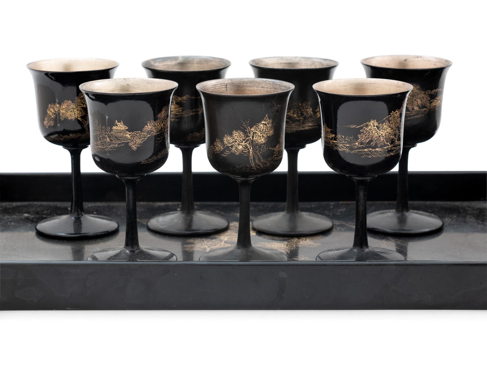 Fifteen Chinese Black and Gilt Lacquer 'Landscape' Articles