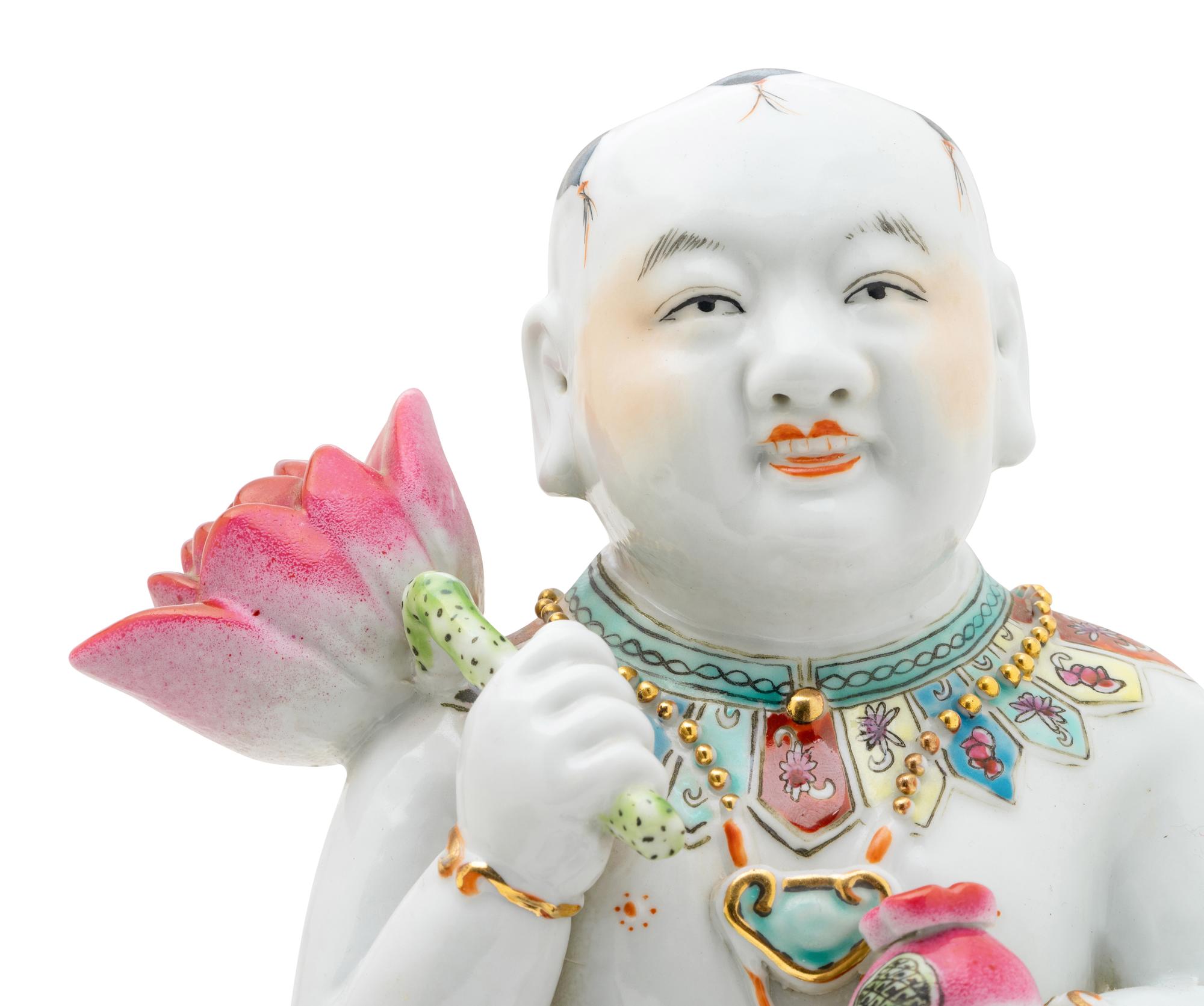Two Chinese Famille Rose Porcelain Figures of Boys