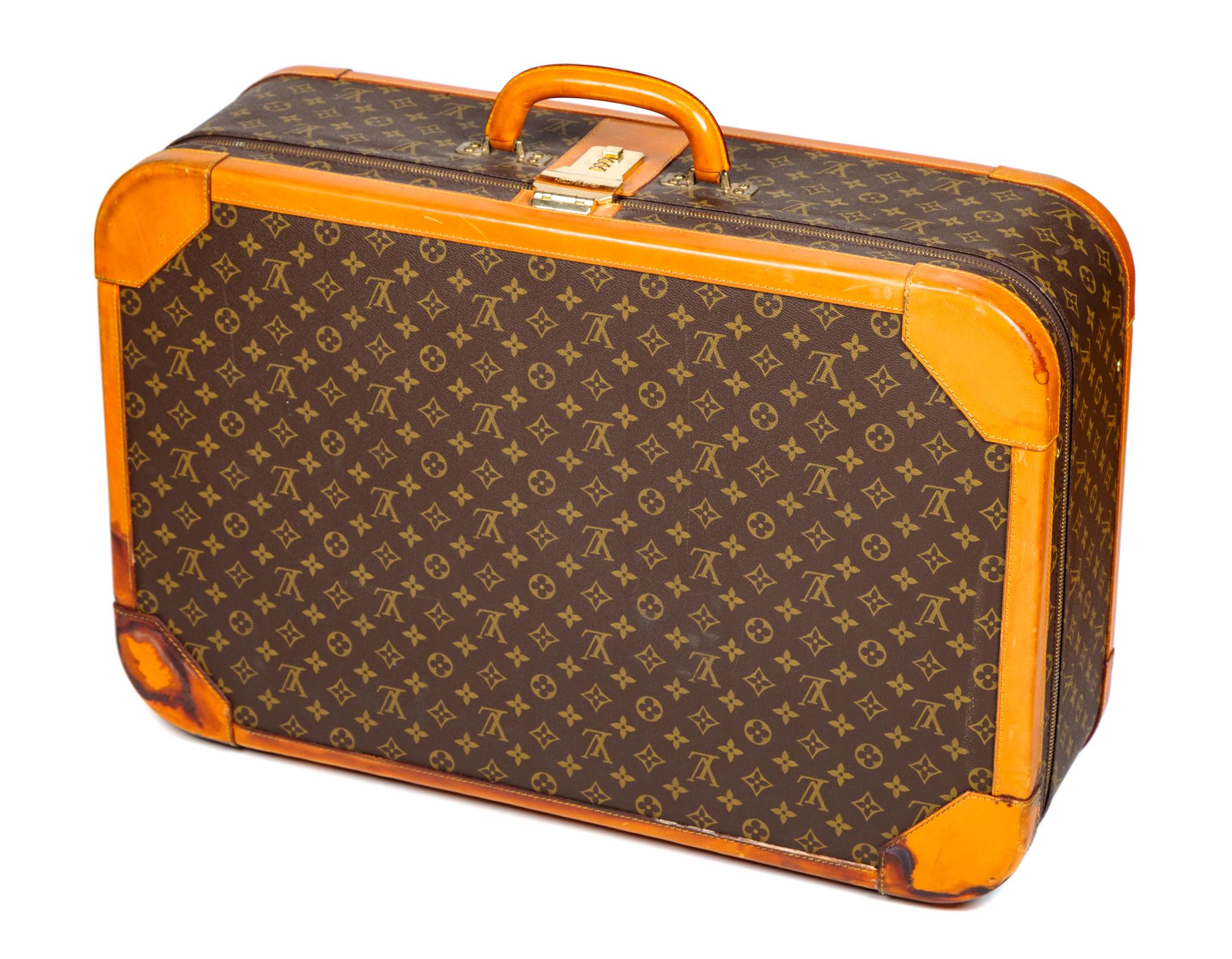 A Louis Vuitton Stratos Monogram Canvas Soft Sided Suitcase, 27.5" L x 17.75" H x 8.25" D; Handle drop: 2".