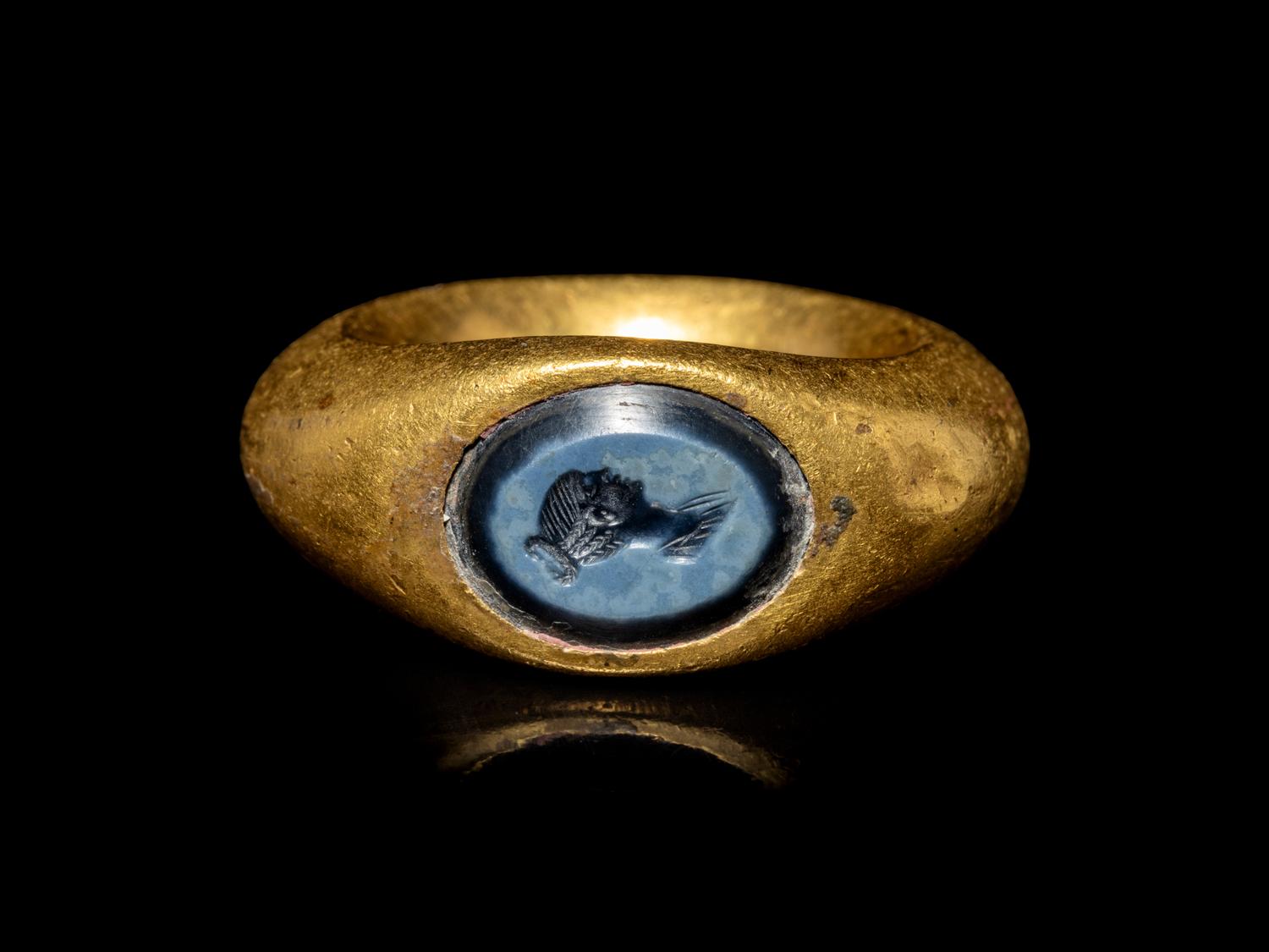 A Roman Gold and Nicolo Finger Ring with a Female Portrait Head