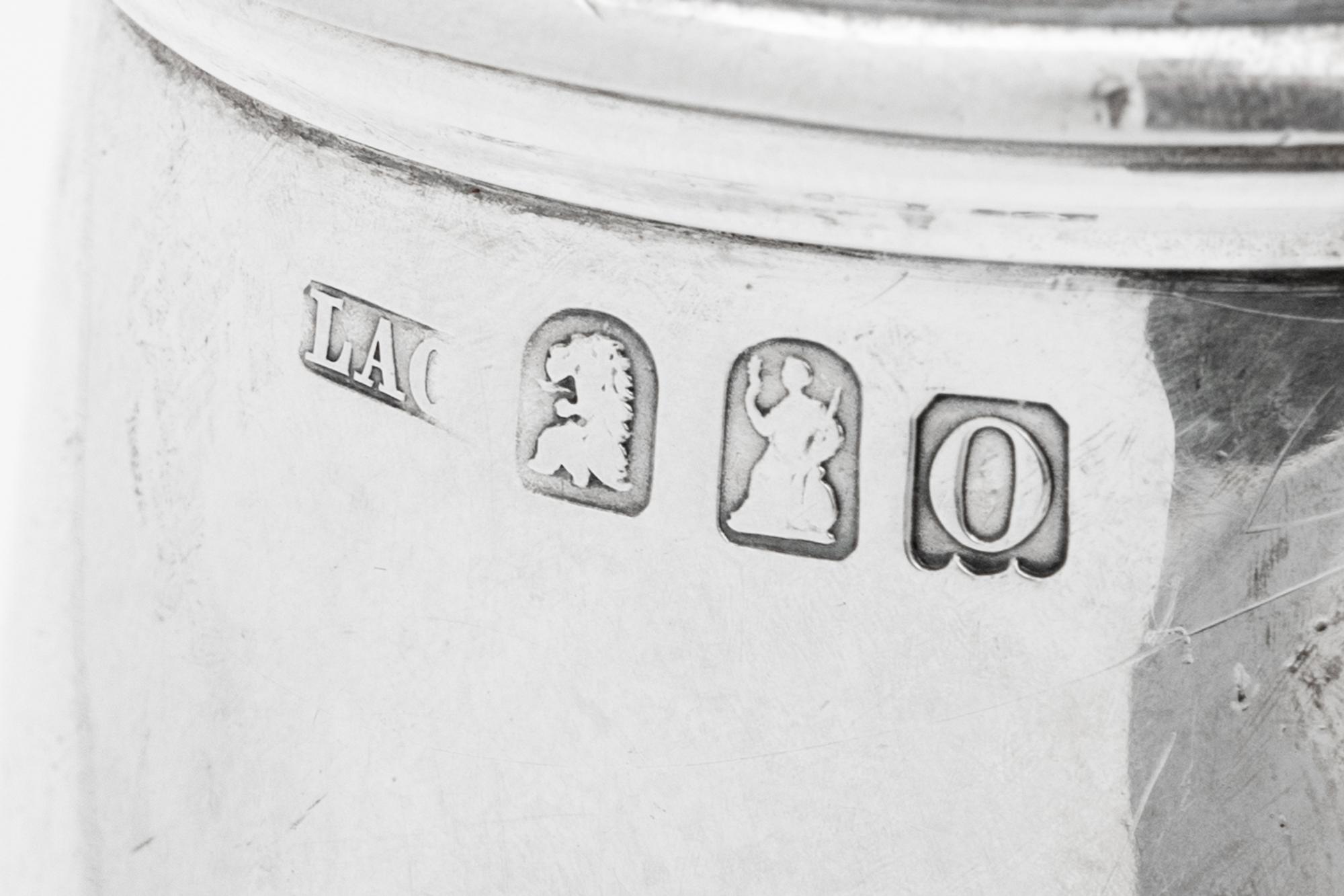 A Pair of English Britannia Silver Coffee Pots