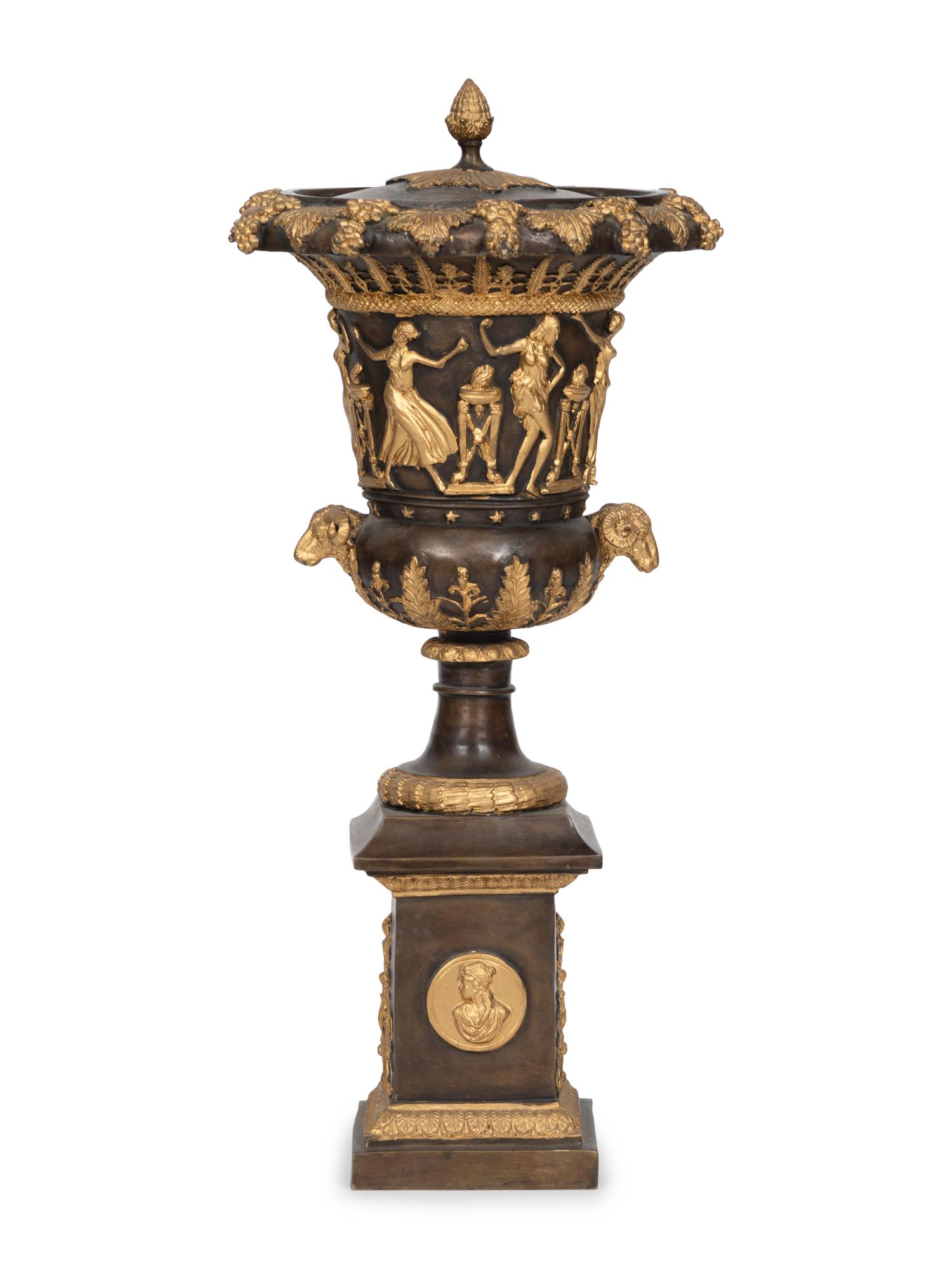 An Empire Style Cast Bronze Parcel Gilt Lidded Campagna Urn