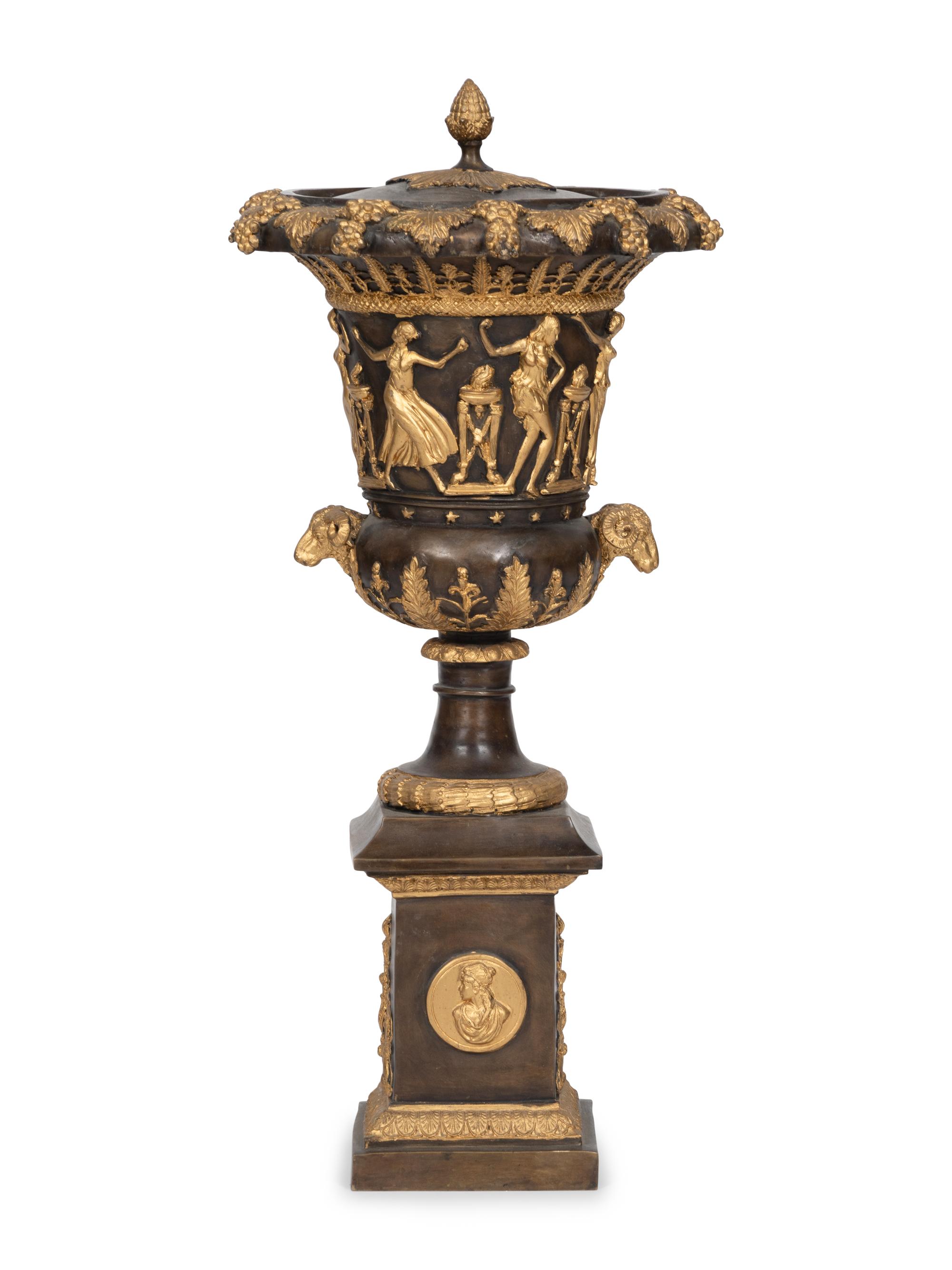 An Empire Style Cast Bronze Parcel Gilt Lidded Campagna Urn