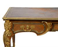 A Louis XVI Style Mahogany and Gilt Bronze Mounted Partners Bureau Plat — L. CUEUNIERES, THIRD QUARTER 19TH CENTURY