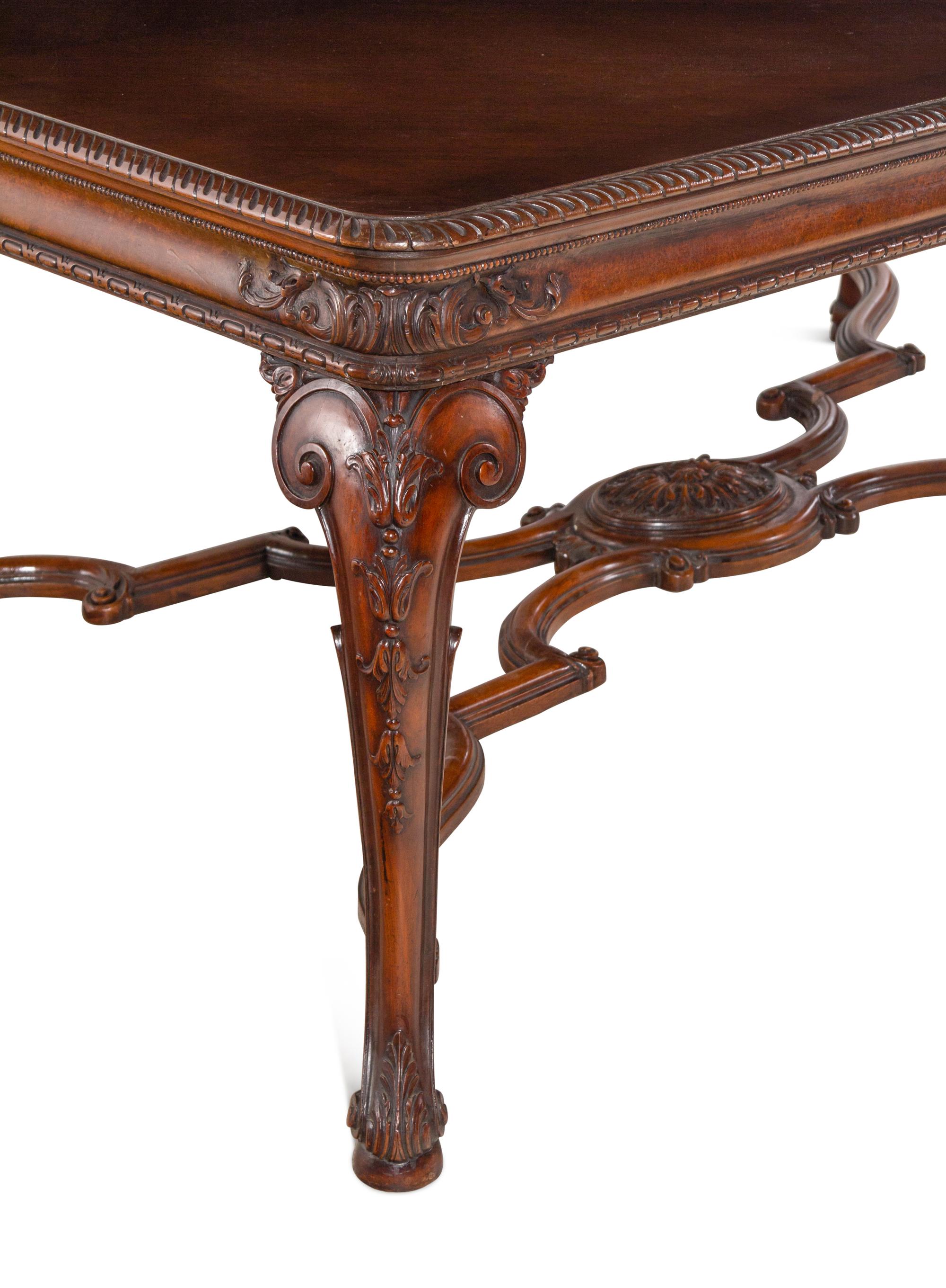 A George II Style Walnut Dining Table