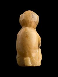 An Egyptian Carved Bone Monkey