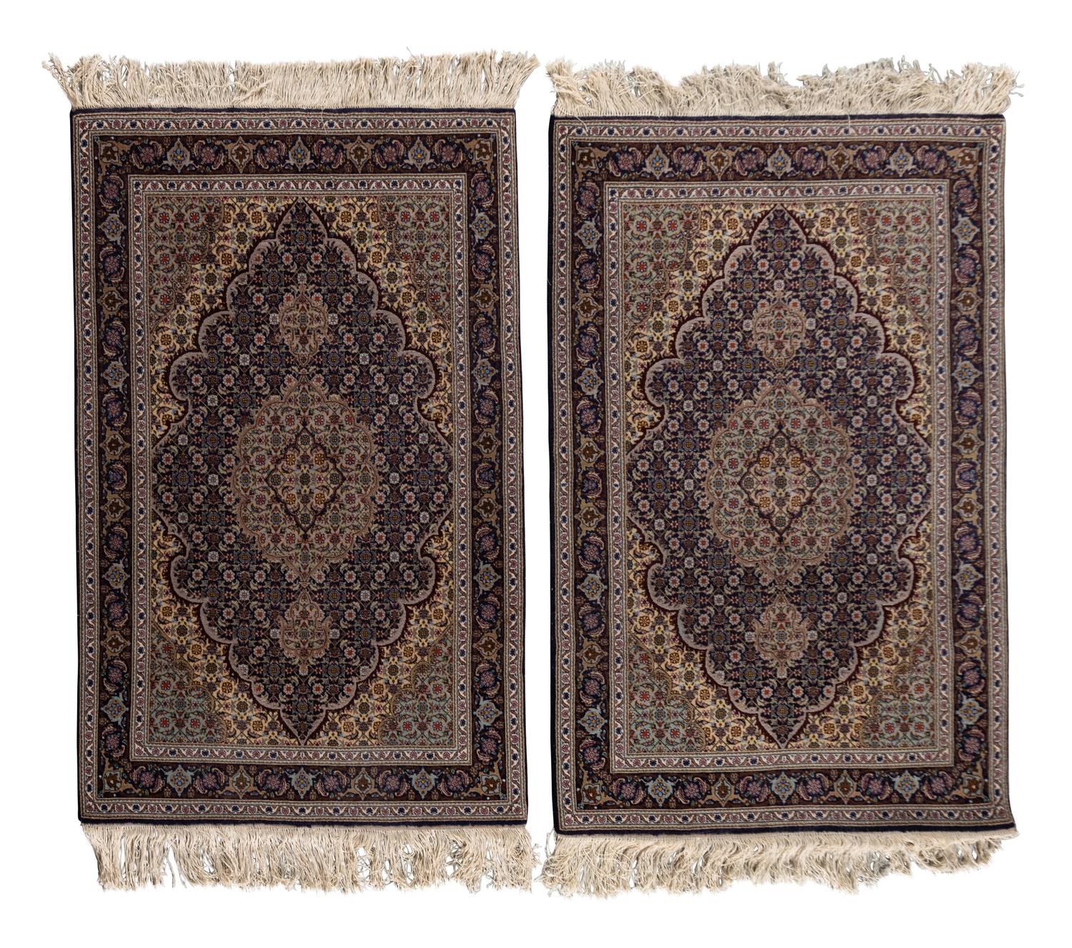 A Pair of Persian Rugs