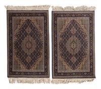 A Pair of Persian Rugs