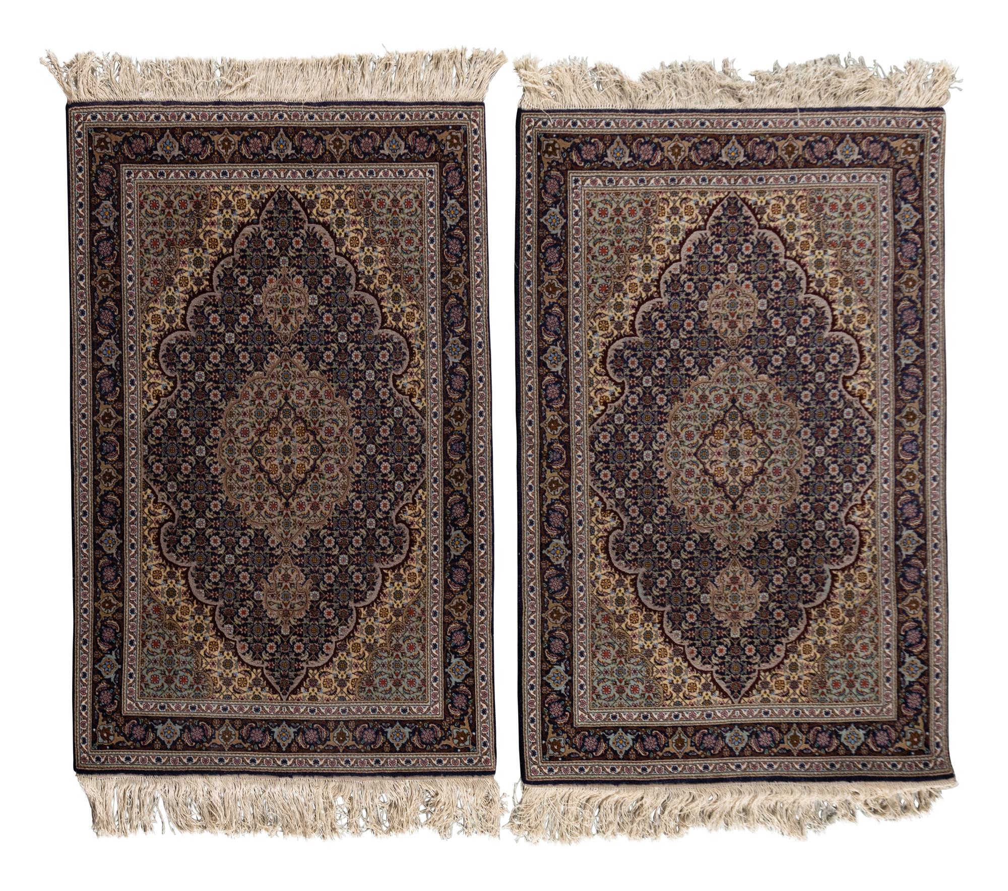A Pair of Persian Rugs