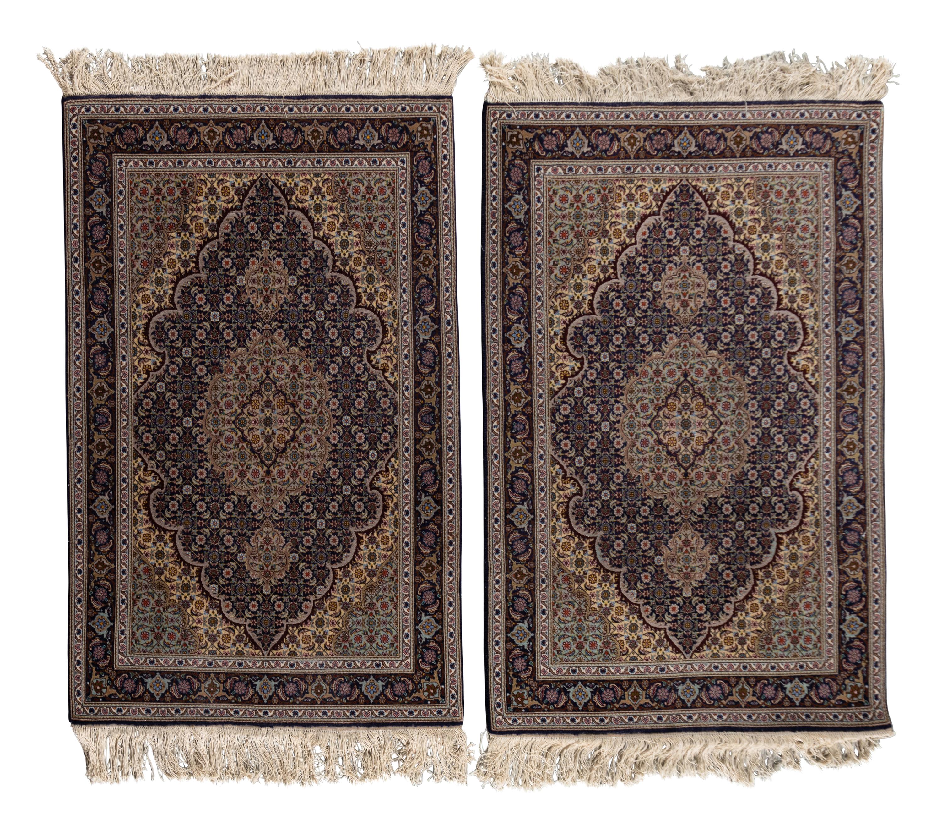 A Pair of Persian Rugs
