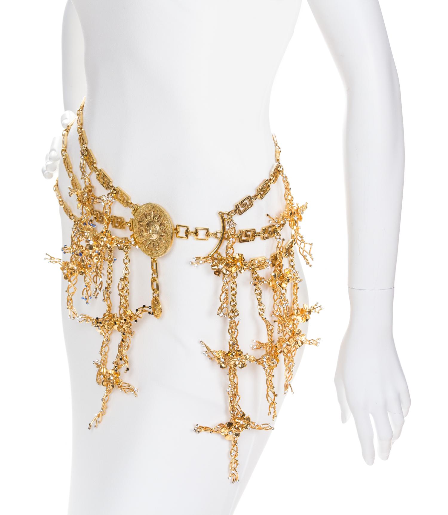 A Gianni Versace Runway Cross and Greco Link Belt, Shortest length: 27"- 32"; Crosses: 4.5" x 3.5"; Medallion: 2.25" x 2.25".