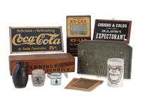 A Group of Eleven Advertising Plaques, Boxes, Jars and Pamphlets