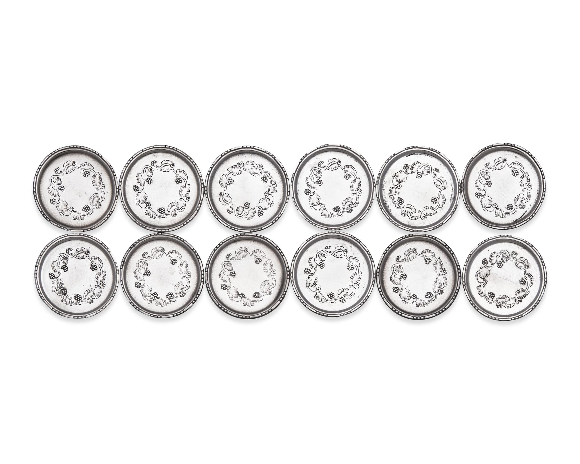 A Set of Twelve Georg Jensen Silver Coasters