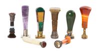 A Collection of Eight Diminutive Seals, Height of tallest 1 3/4 inches.
