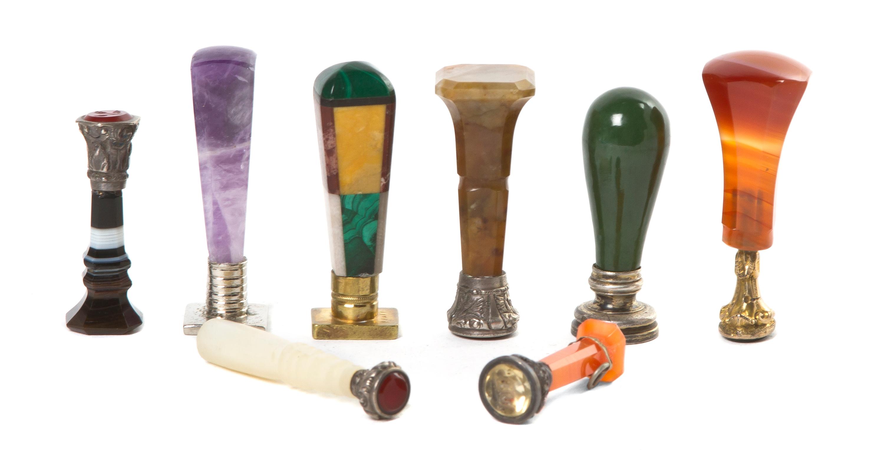 A Collection of Eight Diminutive Seals, Height of tallest 1 3/4 inches.