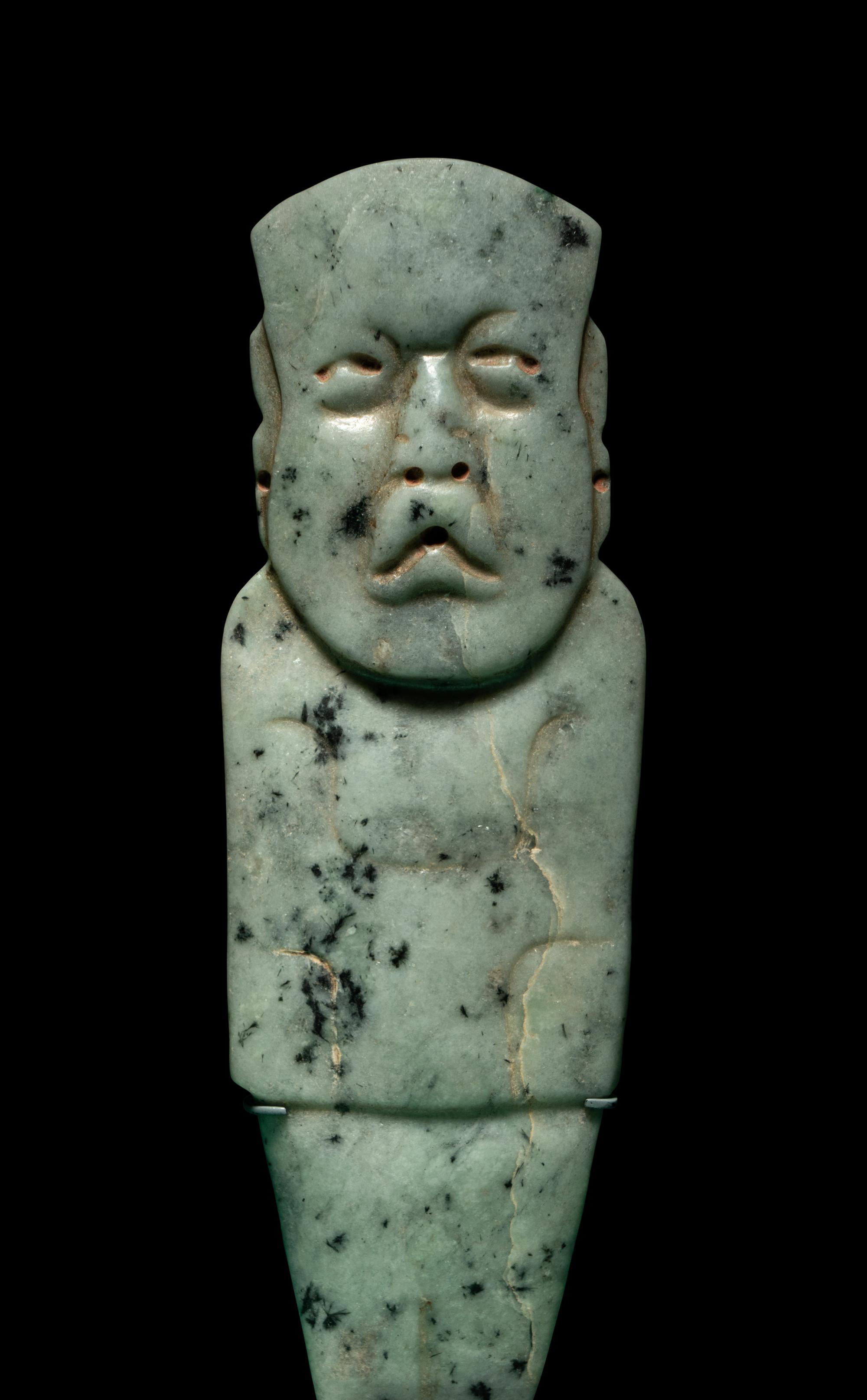 An Olmec Jade Figural Celt