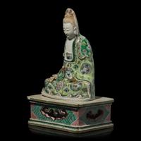 A Chinese Enameled Biscuit Figure of Guanyin Seated, with Associated Stand, Qing Dynasty 清 素三彩觀音坐像 帶木座
