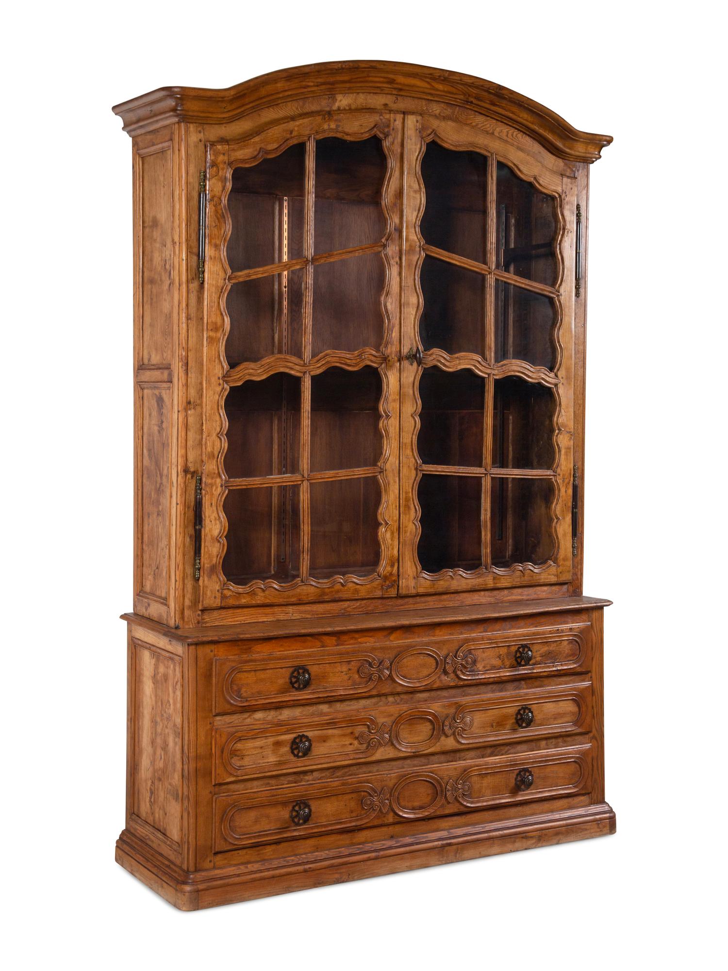 A Louis XVI Provincial Carved Oak Bookcase