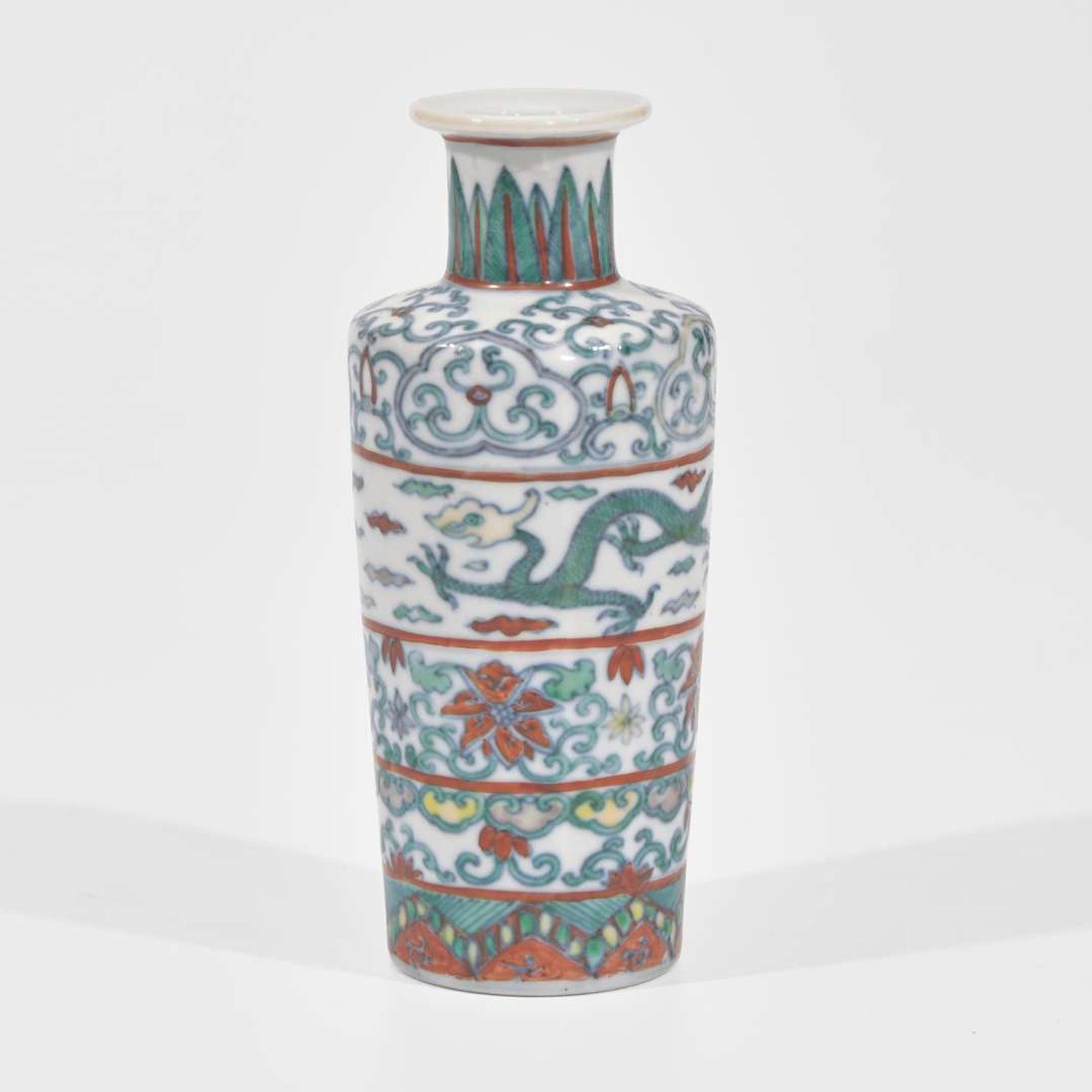A Chinese Dehua porcelain small tripod censer and a small doucai vase 德化窑三足香炉及斗彩小花尊一件 17th/18th century and later ??????? ???