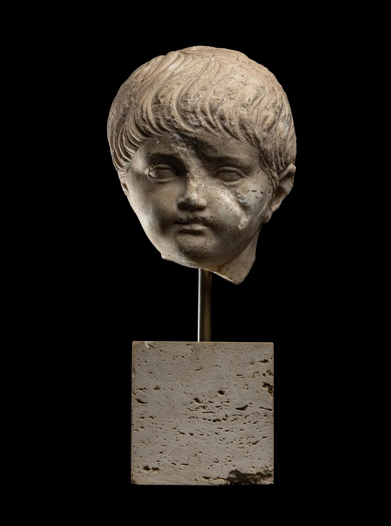 A Roman Marble Portrait Head of a Boy