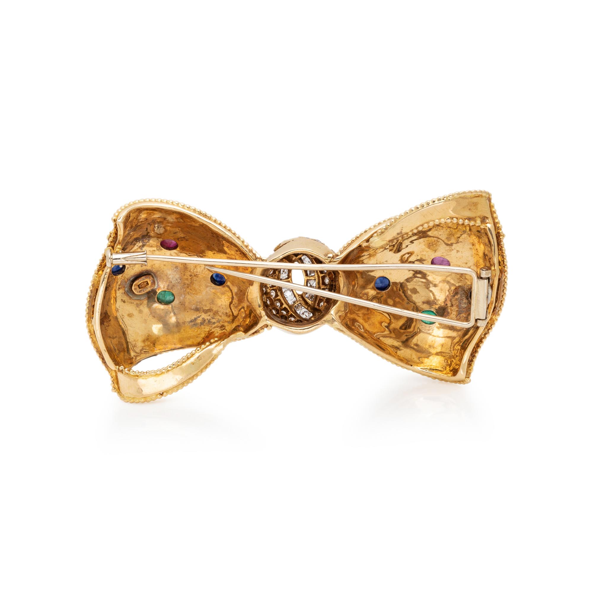 YELLOW GOLD AND MULTIGEM BOW BROOCH
