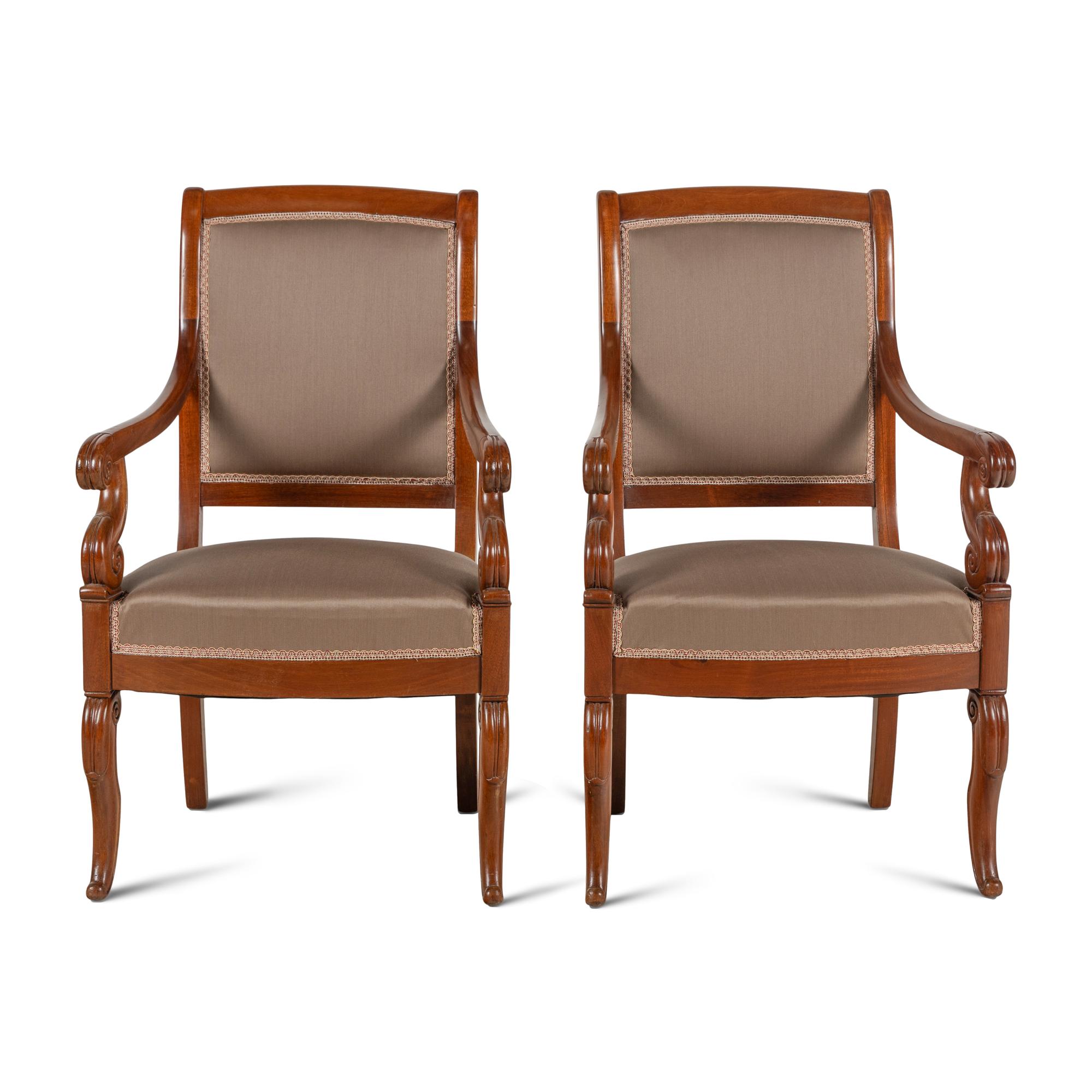 A Pair of Louis Philippe Walnut Fauteuils