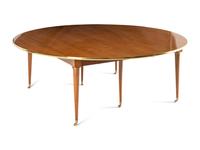 A Directoire Style Brass Mounted Walnut Dining Table