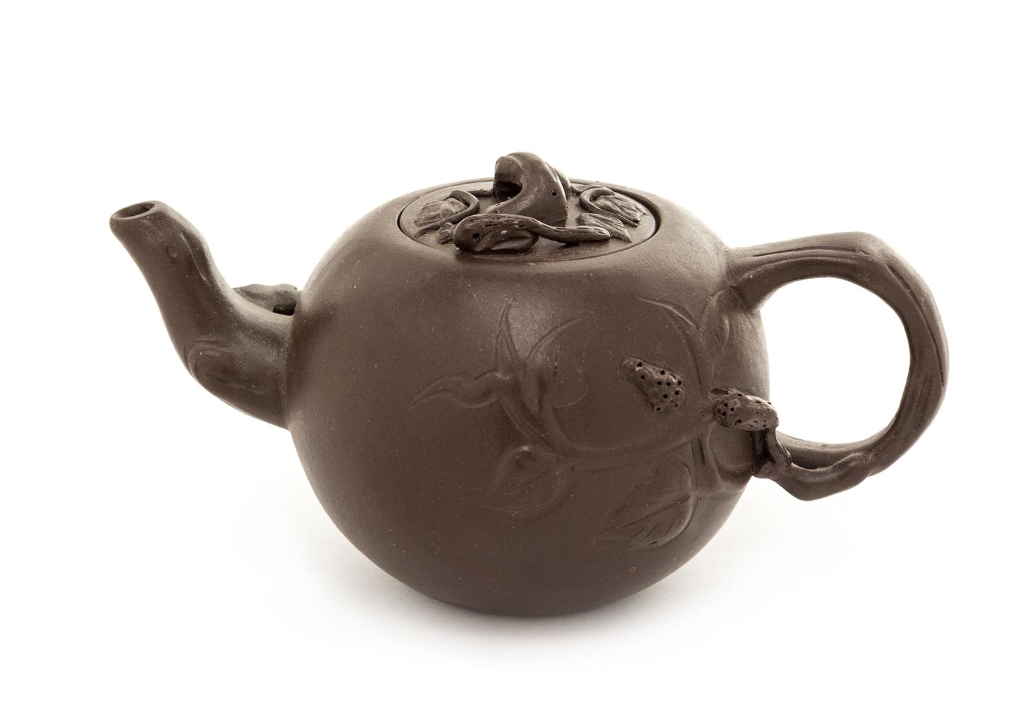 A Yixing Pottery Teapot Height 2 1/2 inches.