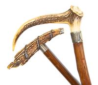 Two Antler Cane Handles, Height of taller overall 35 5/8 x width of handle 8 1/4 inches.