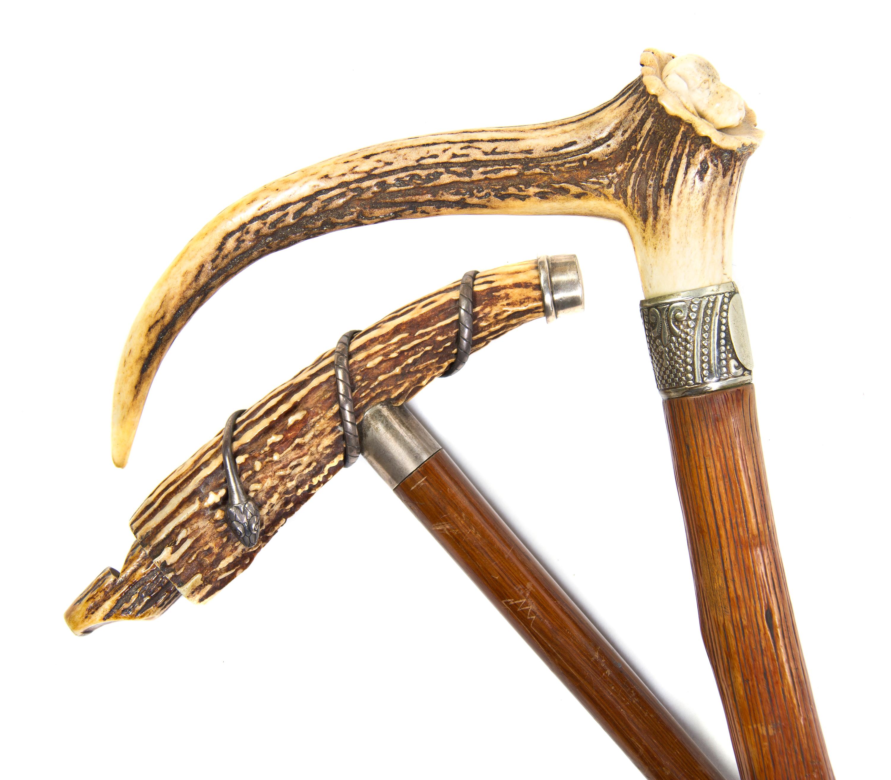 Two Antler Cane Handles, Height of taller overall 35 5/8 x width of handle 8 1/4 inches.