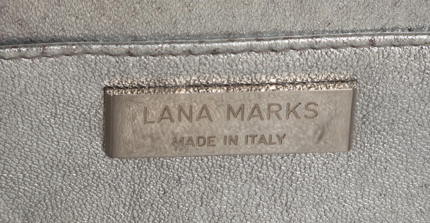 Seven Designer Bags: One Dior, Two Ralph Rucci, One Giorgio Armani, One Prada, One Lana Marks, and One Unlabeled