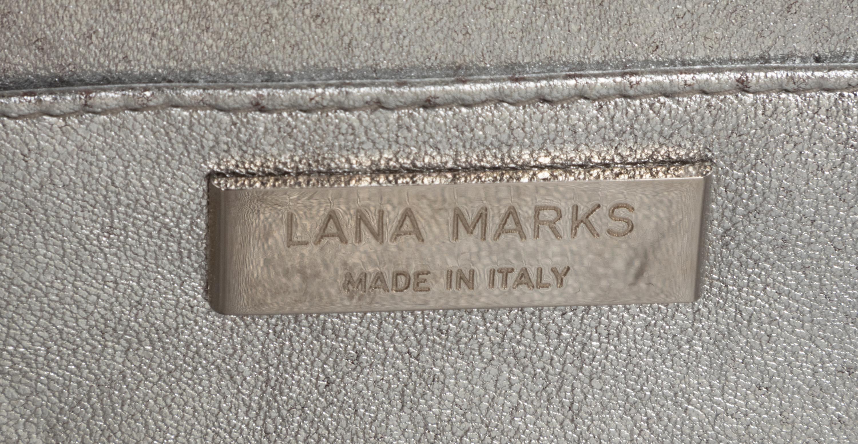 Seven Designer Bags: One Dior, Two Ralph Rucci, One Giorgio Armani, One Prada, One Lana Marks, and One Unlabeled