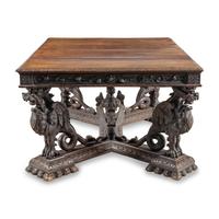 A Renaissance Revival Carved Oak Dining Table
