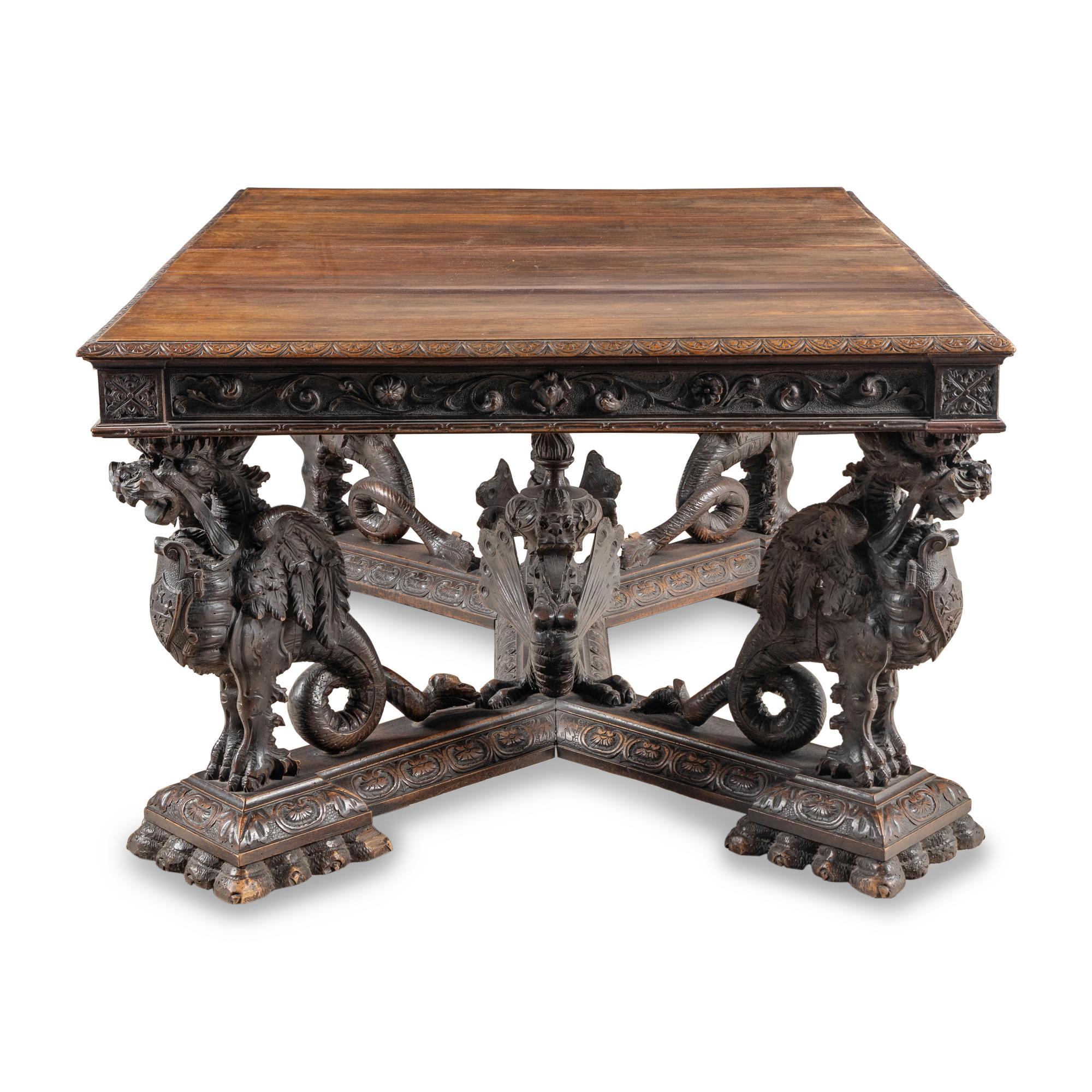 A Renaissance Revival Carved Oak Dining Table