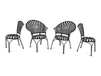 A Spring Steel Garden Table and Eight Chairs by Francois Carre